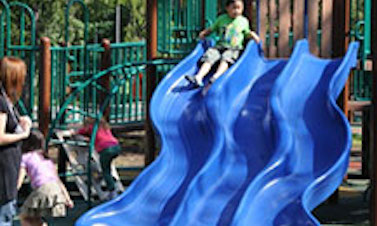 Children playing on a slide